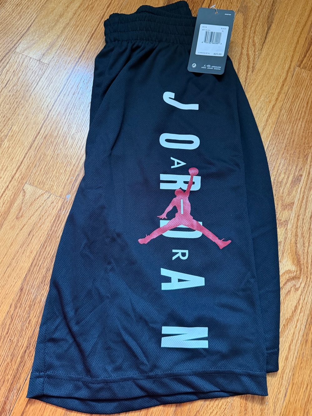 New with tags Black Jordan Basketball Shorts with Red Jumpman and White Logo